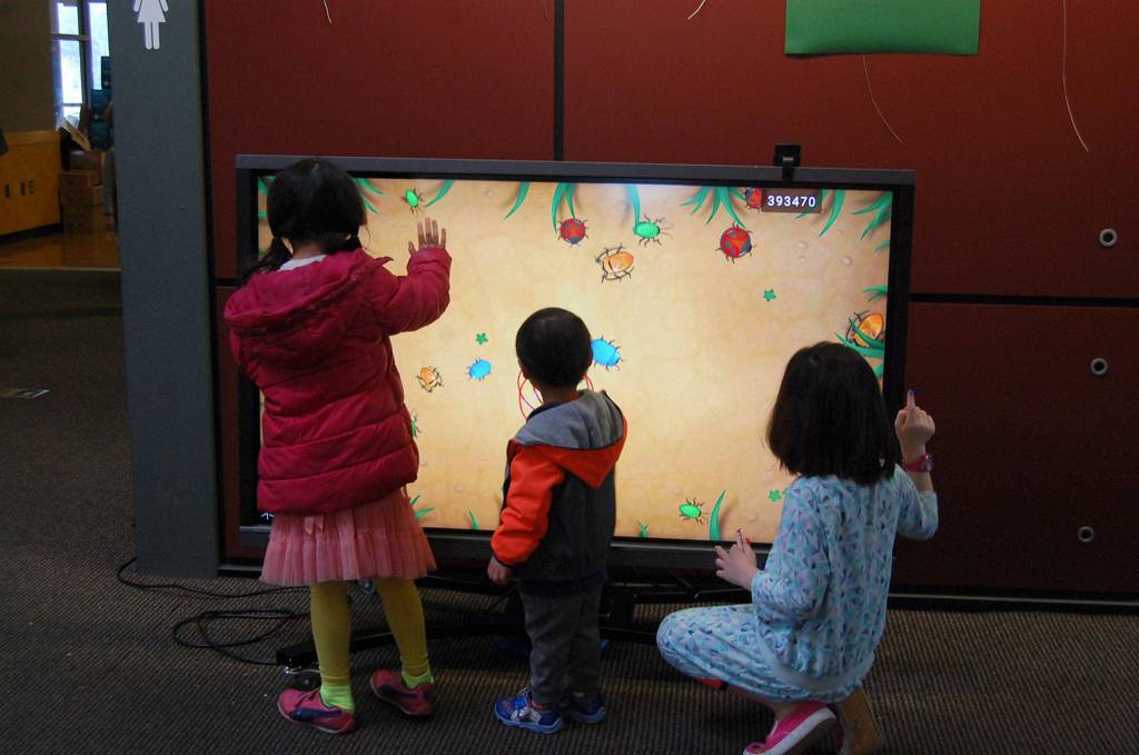 Leap for Green offers many interactive activities for kids, including arts and crafts, games and story time with the Mercer Island Library. Katie Metzger/staff photo