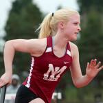 Photo courtesy of Jay Na                                The Mercer Island Islanders girls track team earned a 84-65 victory against the Liberty Patriots on April 5. The Islanders improved their overall record to 5-0 with the victory. Islanders athletes earning first place in their respective events consisted of Gretchen Blohm (200, 400 relay, 800 relay, 1600 relay), Margaret Baker (400, 800 relay, 1600 relay), Chloe Michaels (1600, 3200), Maya Virdell (300 hurdles, 400 relay, 800 relay, 1600 relay), Eliza Crenshaw (400 relay, 800 relay), Katie McCormick (400 relay, high jump), Ella Hensey (1600 relay, long jump), Faith Osei-Tutu (shot-put) and Aleksandra Kogalovski (pole vault). Crenshaw (pictured) competes in the 800-meter relay against Liberty.