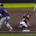 Photo courtesy of Don Borin/Stop Action Photography                                Mercer Island Islanders senior first baseman Justin Ho slides safely into third base against the Juanita Rebels in the KingCo 3A championship game. The Islanders defeated the Rebels 11-1 on May 5 at Bannerwood Park in Bellevue.