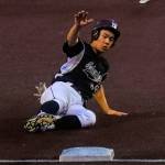 Photo courtesy of Don Borin/Stop Action Photography                                Mercer Island Islanders senior first baseman Justin Ho slides safely into third base against the Juanita Rebels in the KingCo 3A championship game. The Islanders defeated the Rebels 11-1 on May 5 at Bannerwood Park in Bellevue.