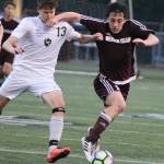 MIs Luca Mtskhetadze tangles with Redmonds Ethan Cain. Andy Nystrom / staff photo