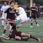 Mercer Island and Redmond players collide. Andy Nystrom / staff photo