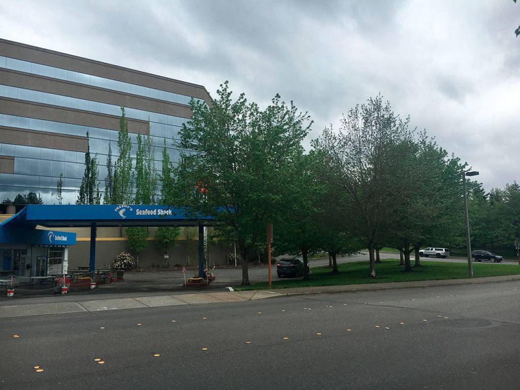 Mercer Island plans to sell land near Freshys Seafood Shack for $2.3 million to the adjacent landowner, who will consolidate and redevelop both parcels and provide 65-70 underground commuter parking spaces for use by Mercer Island residents during peak commute hours. Katie Metzger/staff photo