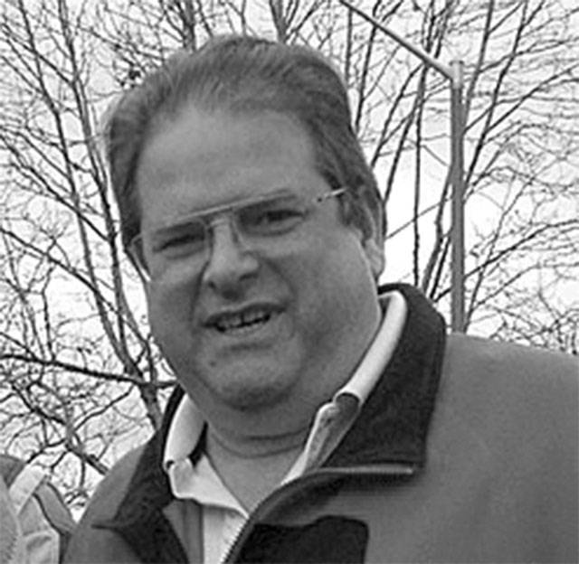 CHRISTOPHER J. NORTON