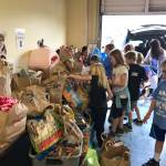 K-Kids unload more than 700 donations at Homeward Pet. Photo courtesy of Julia Hokanson