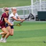 Photo courtesy of Rick Edelman/Rick Edelman Photography                                Mercer Island senior Katie Brodsky, left, tries to track down a loose ball in the state championship game. Brodsky scored three goals in the contest.