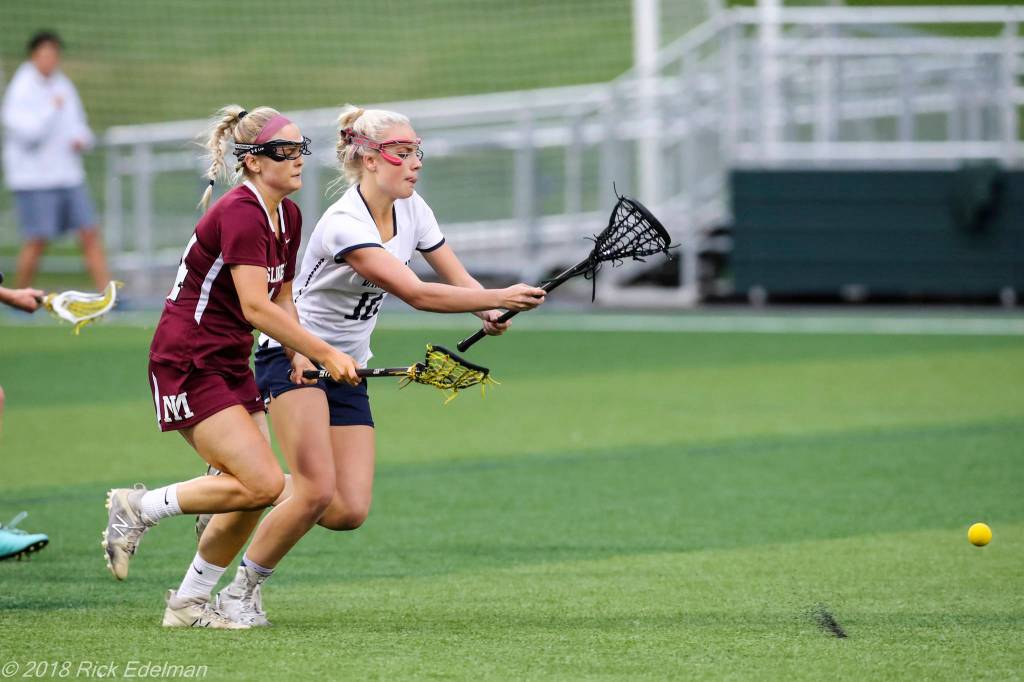 Photo courtesy of Rick Edelman/Rick Edelman Photography                                Mercer Island senior Katie Brodsky, left, tries to track down a loose ball in the state championship game. Brodsky scored three goals in the contest.