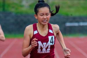 Photo courtesy of Don Borin/Stop Action Photography                                Mercer Island Islanders senior track athlete Kayla Lee captured first place in the 400 with a time of 56.16 at the Class 3A District II championships on May 18 at the Southwest Athletic Complex in Seattle.