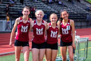 Photo courtesy of Don Borin/Stop Action Photography                                The Mercer Island Islanders 800 relay squad consisting of Eliza Crenshaw, Maggie Baker, Kayla Lee and Gretchen Blohm captured first place with a time of 1:42.80 at the Class 3A District II track championships on May 18 at the Southwest Athletic Complex in Seattle. Ballard finished in second place with a time of 1:44.20.