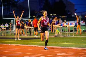 Photo courtesy of Don Borin/Stop Action Photography                                The Mercer Island Islanders 1600 relay squad consisting of Maya Virdell, Gretchen Blohm, Maggie Baker and Kayla Lee earned first place with a time of 3:52.75 at the Class 3A District II championships at the Southwest Athletic Complex in Seattle. Lee (pictured), who ran the fourth and final leg of the relay, was well in front of all other competitors down the stretch. Holy Names finished in a distant second place with a time of 4:00.44.