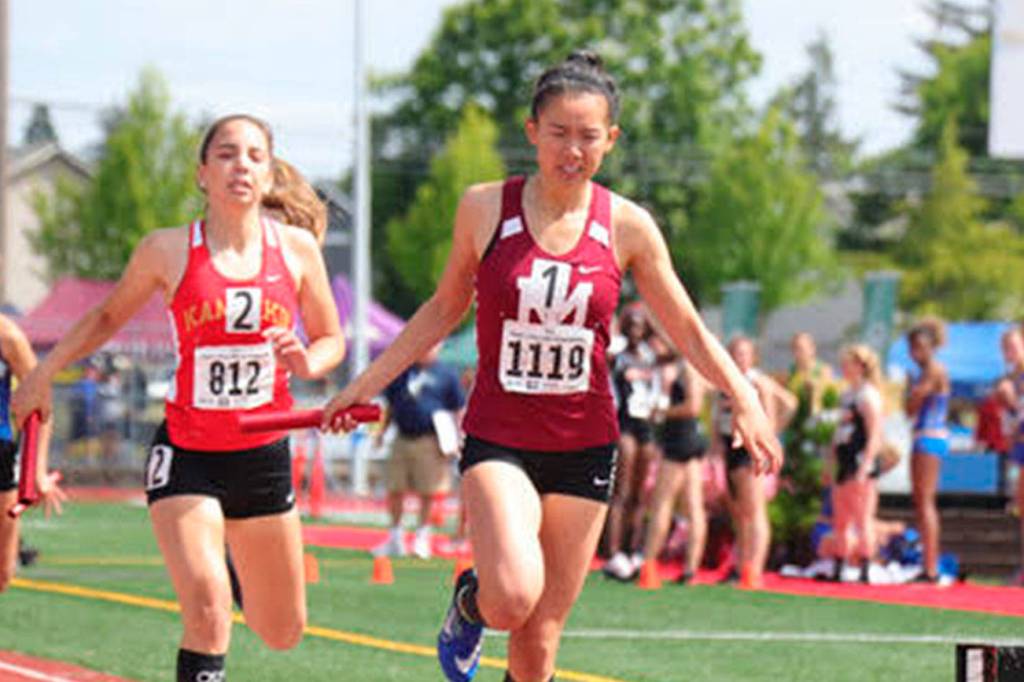 The Mercer Island Islanders girls 800 relay and 1600 relay teams captured first place at the Class 3A state track and field meet on May 26 at Mount Tahoma High School in Tacoma.                                The 800 relay team consisting of Maya Virdell, Maggie Baker, Gretchen Blohm and Kayla Lee earned first place with a time of 1:42.86. The 1600 relay team of Virdell, Baker, Blohm and Lee cruised to a first place finish with a time 3:51.56. Shorecrest finished in a distant second place with a time of 3:57.80. Lee (pictured in the 800 relay) ran the anchor leg on both relay teams.                                Photo courtesy of Don Borin/Stop Action Photography