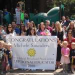 Exceptional Educator Michele Saunders smiles with current and former students and parents at Sunnybeam School on May 30. Katie Metzger/staff photo