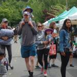 Community members stroll through the farmers market in downtown Mercer Island on June 3. Katie Metzger/staff photo
