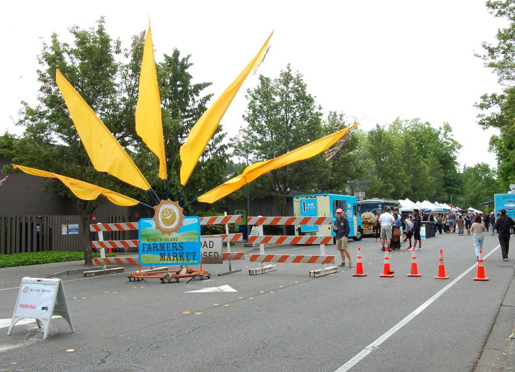 A large sign welcomes patrons to the first Mercer Island Farmers Market of the season on June 3. Katie Metzger/staff photo
