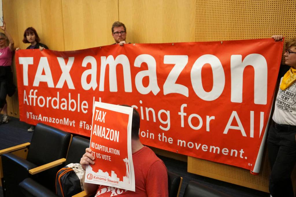 The public files into the City Council Chambers to voice their opinions prior to the vote to repeal the head tax. Photo by Melissa Hellmann