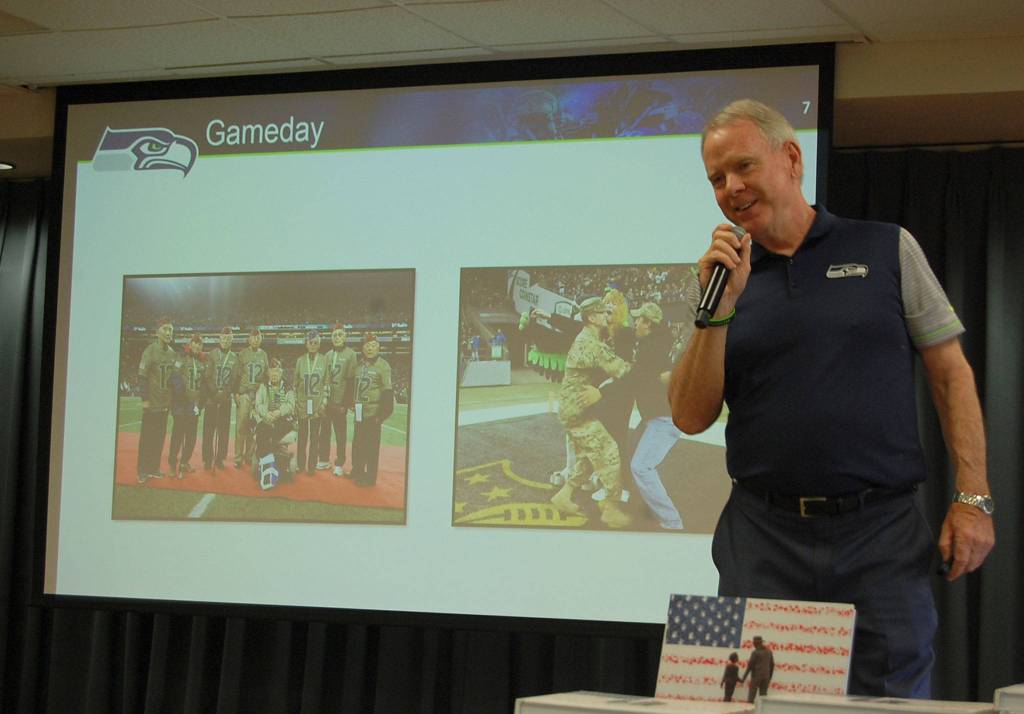 Seattle Seahawks Vice President of Community Outreach Mike Flood speaks about patriotism and how the team honors military members and their families. Katie Metzger/staff photo