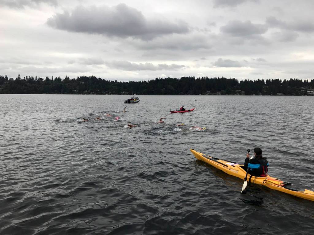 Avid swimmers spanning six states partook in the Mercer Island marathon swim on June 8. The distance, which covered 20 kilometers, saw 10 competitors complete the swim around Mercer Island in Lake Washington.                                Participants included Daniela Klaz (Maine), Marcy MacDonald (Connecticut), Chris Greene (Georgia), Cindy Werhane (Oregon), Rijl Barber (Oregon), Wendy Van De Sompele (Washington), Jessi Harewicz (Washington), Suzie Dods (California) and Kim Rutherford (California). Klaz finished in first place with a time of 6:15.28.The swimmers (pictured) began their journey near the fishing dock at Luther Burbank Park at 8 a.m. on June 8 as they headed toward the east channel bridge. Photo courtesy of Liz Rosen