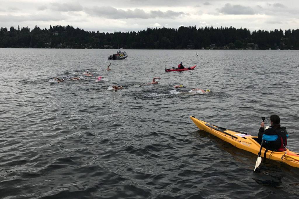 Avid swimmers spanning six states partook in the Mercer Island marathon swim on June 8. The distance, which covered 20 kilometers, saw 10 competitors complete the swim around Mercer Island in Lake Washington.                                Participants included Daniela Klaz (Maine), Marcy MacDonald (Connecticut), Chris Greene (Georgia), Cindy Werhane (Oregon), Rijl Barber (Oregon), Wendy Van De Sompele (Washington), Jessi Harewicz (Washington), Suzie Dods (California) and Kim Rutherford (California). Klaz finished in first place with a time of 6:15.28.The swimmers (pictured) began their journey near the fishing dock at Luther Burbank Park at 8 a.m. on June 8 as they headed toward the east channel bridge. Photo courtesy of Liz Rosen