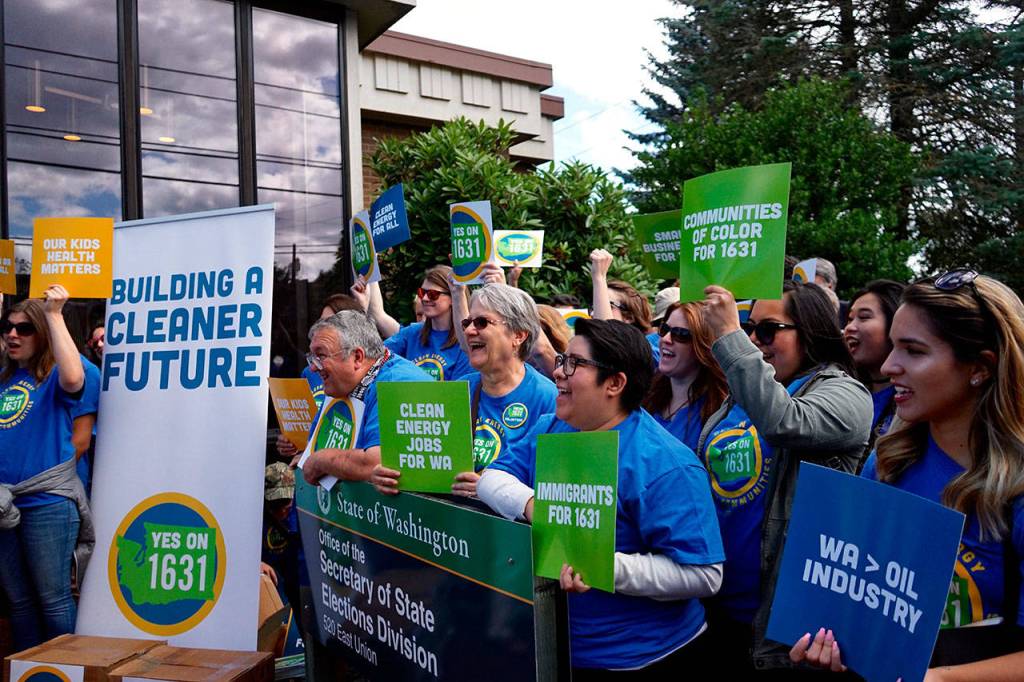 Activists rallied in support of I-1631 in Olympia on July 2. The Yes On I-1631 campaign collected roughly 100,000 more signatures than needed to place the initiative on the November ballot. Photo contributed by Yes On I-1631.