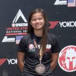 Mercer Island resident Anna Bolger (far right) earned a third-place finish in the 14-17 year-old age group at the Spartan Race Chicago Super and the Spartan Race Chicago Sprint on June 23-24 at the Richmond Hunting Club in Chicago.                                Bolger clocked a time of 3:19:35 in the Spartan Race Chicago Super and a time of 2:08:57 in the Spartan Race Chicago Sprint. The Super, a Spartan Signature Race, included 8-10 miles of 24-29 obstacles for racers to tackle at the Richmond Hunting Club. The Sprint event consisted of 3-5 miles and 20-23 obstacles. The courses features miles of technical terrain, steep elevation and obstacles to push competitors to their limits.                                Photo courtesy of Flora Goodman/Elevate Communications