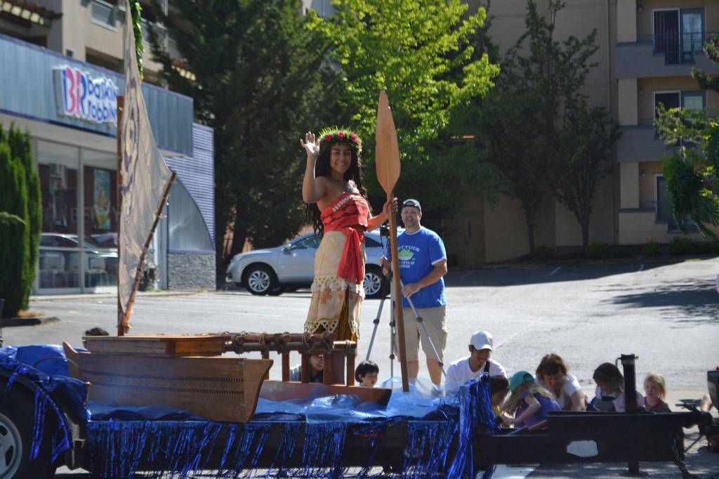 Moana waves from her float in the Mercer Island Summer Celebration parade on July 14. Katie Metzger/staff photo