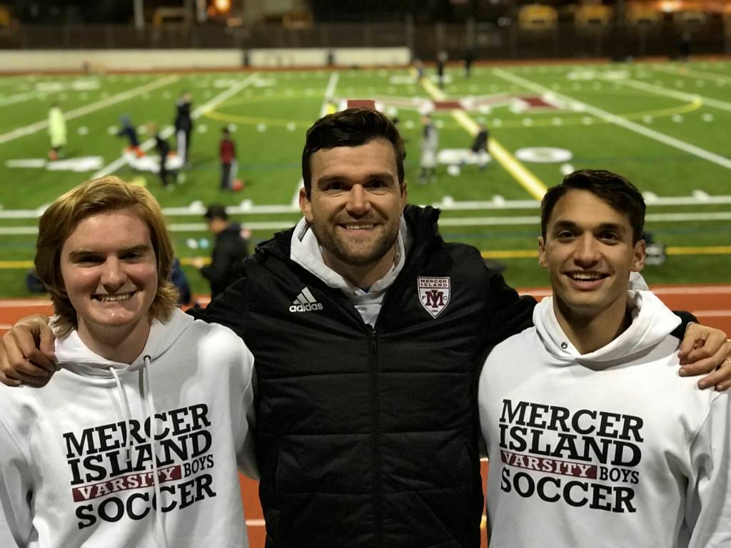 Photo courtesy of Tim Bauman                                Mercer Island boys soccer players Reis Kissel and Hunter Bauman were named to the Washington High School first-team all-state boys soccer this past May.                                It was the third consecutive season Kissel and Bauman received first-team, all-state honors. Reis, who played defender for the Islanders, will be attending Vassar College this fall. Bauman, who played midfielder for the Islanders, will be attending the University of Washington. Bauman (left), Islanders head coach Colin Rigby (center) and Kissel (right) are pictured in the above photo.