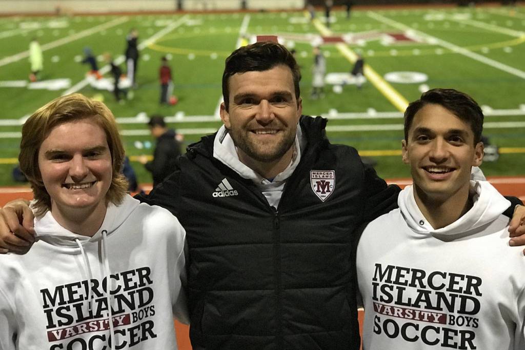 Photo courtesy of Tim Bauman                                Mercer Island boys soccer players Reis Kissel and Hunter Bauman were named to the Washington High School first-team all-state boys soccer this past May.                                It was the third consecutive season Kissel and Bauman received first-team, all-state honors. Reis, who played defender for the Islanders, will be attending Vassar College this fall. Bauman, who played midfielder for the Islanders, will be attending the University of Washington. Bauman (left), Islanders head coach Colin Rigby (center) and Kissel (right) are pictured in the above photo.