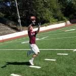Mercer Island senior football player John Majewski hauls in a pass during a player led team workout on July 18 on Mercer Island. The Islanders, who finished with an overall record of 7-4 during the 2018 season, are looking to build on last years sensational season on the gridiron.                                Shaun Scott, staff photo