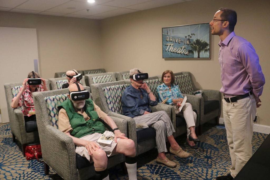 Island House residents and guests experience virtual reality. Katie Metzger/staff photo