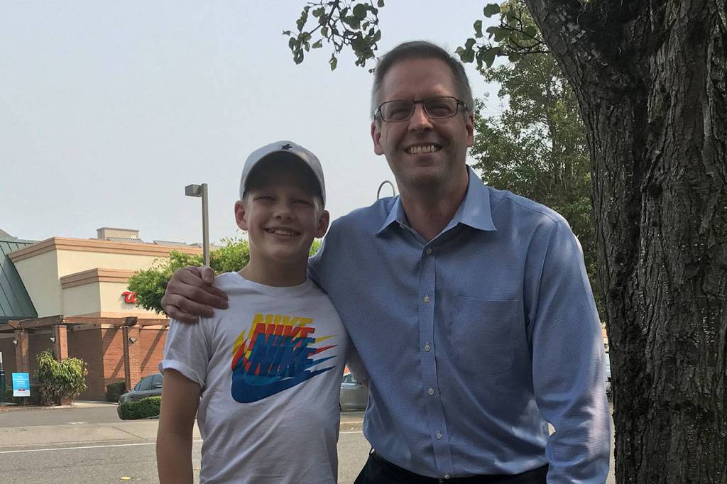 Gordon Gibson, left, pictured with his father Graeme, right, will compete at a professional jiu jitsu competition titled, Fight2Win on Sept. 14 at the Seattle Center. Shaun Scott/staff photo
