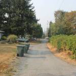 These properties, off of Southeast 40th Street on Mercer Island, are owned by the French American School and part of an expansion plan that also includes the Stroum Jewish Community Center (SJCC). Neighbors are separated from the SJCC by the greenbelt on the right. Katie Metzger/staff photo