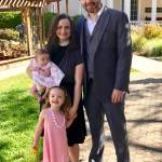 Rev. Elizabeth Riley smiles with her family. They will live in the new rectory at Emmanuel Church when it is completed next year. Photo courtesy of Elizabeth Riley