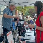There will be another chance to meet the winemakers at this years Art Uncorked, to be held Sept. 9 in Town Center. Katie Metzger/file photo