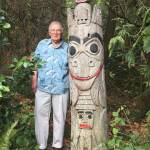 Bob Wiley stands next to a totem pole he carved in 1992 and recently donated to Covenant Shores on Mercer Island. Photo courtesy of Greg Asimakoupoulos