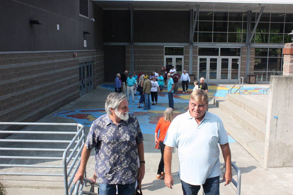 Islanders walk out of the Commons, which used to be the Mushroom before it was demolished about 20 years ago. Katie Metzger/staff photo