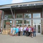 Some members of the Mercer Island High School Class of 1968 pose outside their alma mater on Aug. 24 for their 50th reunion. Photo courtesy of Clay Eals