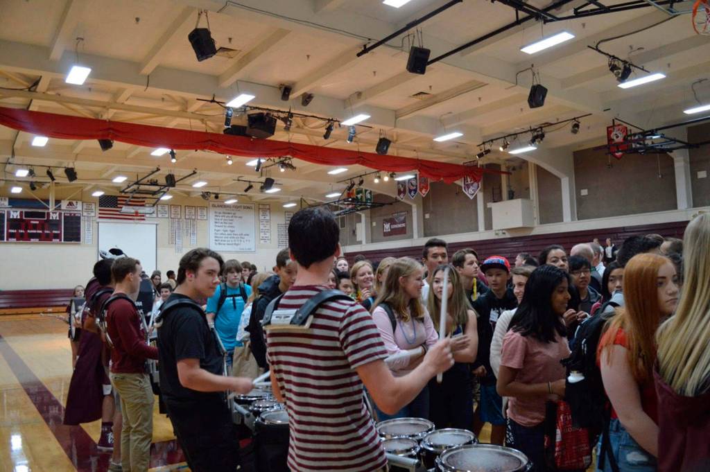 9th graders are welcomed by faculty and staff and the marching band drumline at MIHS. Photo courtesy of Craig Degginger/Mercer Island School District