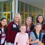 The MIHS cheer squad greets students on their first day at Northwood Elementary. Photo courtesy of Craig Degginger/Mercer Island School District