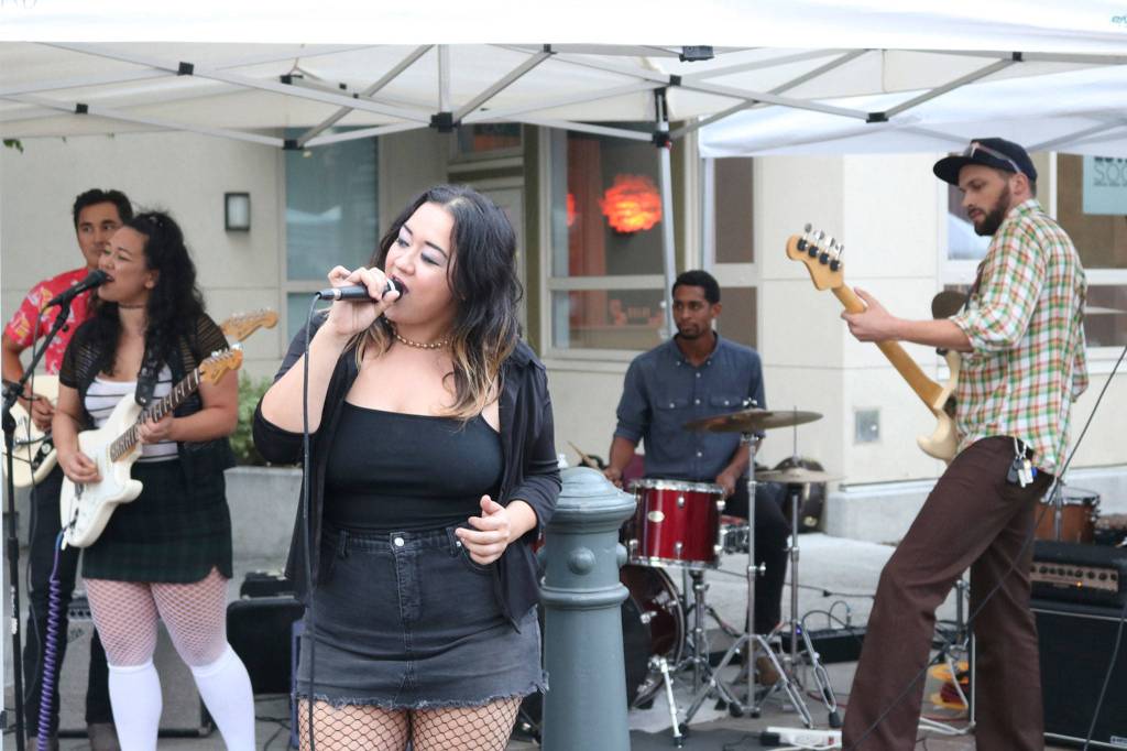 La Fonda, a lyrically driven, indie dream pop band defined by two sisters, singer-songwriters Veronica and Valerie Topacio, performs at Art Uncorked. Katie Metzger/staff photo