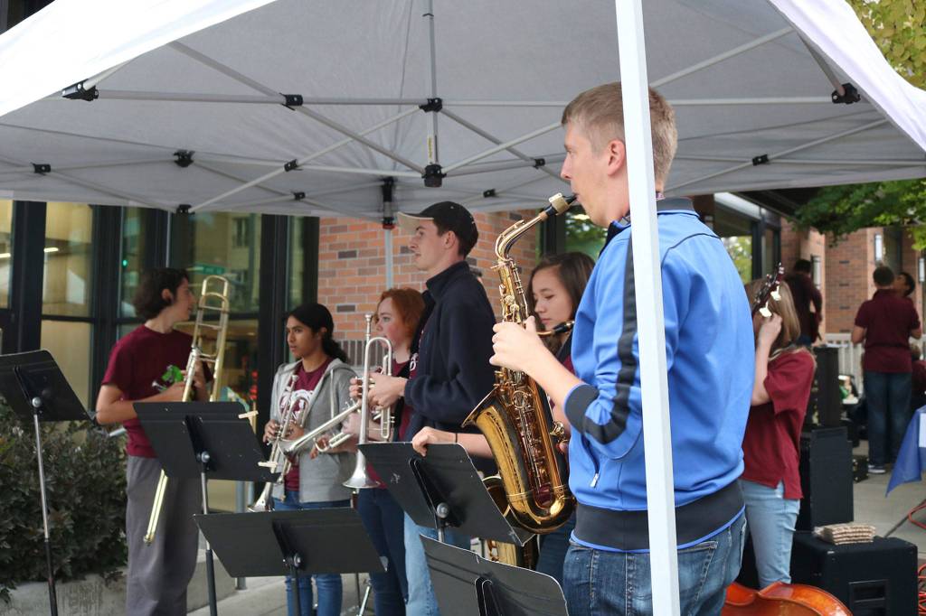 The MIHS jazz band welcomes community members through the main entrance of Art Uncorked. Katie Metzger/staff photo