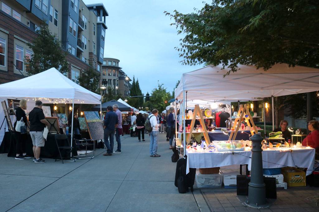 Local artists and winemakers display their fare at Art Uncorked on Sept. 7. Katie Metzger/staff photo