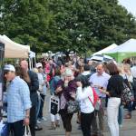 A crowd gathers in the sculpture garden in Mercer Islands Town Center for the annual Art Uncorked event. Katie Metzger/staff photo