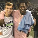 Young Islander meets Seahawk inspiring kids with limb deficiencies