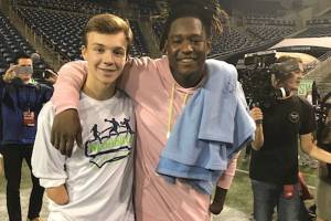 Young Islander meets Seahawk inspiring kids with limb deficiencies
