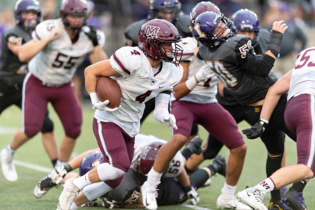 Mercer Island Islanders running back Jack Clayville scored two rushing touchdowns against the Issaquah Eagles on Sept. 7. Mercer Island improved their overall record to 2-0 courtesy of their 13-0 victory against Issaquah. Photo courtesy of Patrick Krohn/Patrick Krohn Photography