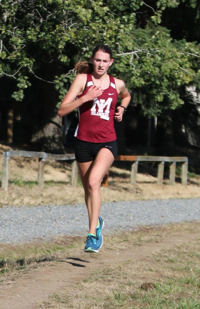 Mercer Islands Maggie Baker leads the way at a cross country meet against Lake Washington and Juanita on Sept. 17 at Marymoor Park. Andy Nystrom / staff photo