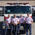 (From left) Mercer Island firefighters Lt. Ray Austin, Dan Jackson, Alec Munro and Lt. Steve McCoy pose for a picture in their pastel pink breast cancer awareness shirts. Photo courtesy of Ray Austin