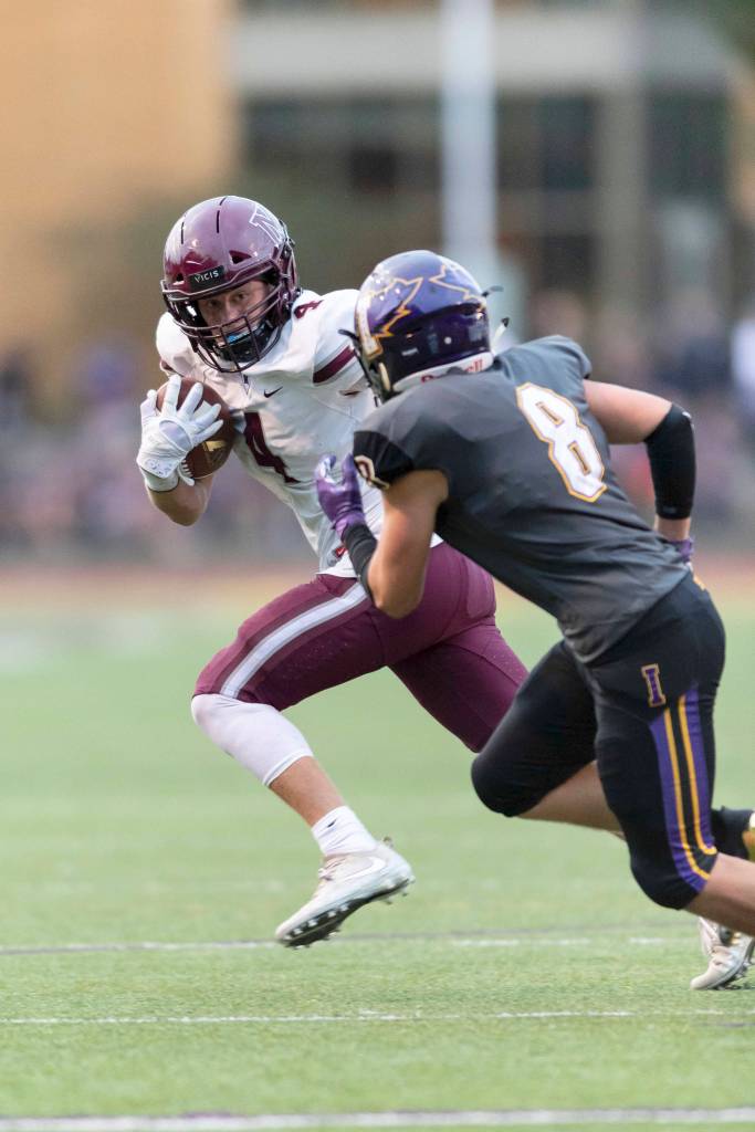 Mercer Island senior running back Jack Clayville (pictured) has been one of the most prolific players on offense for his team throughout the 2018 season thus far. The Islanders have compiled an overall record of 5-0 in early season action. Photo courtesy of Patrick Krohn/Patrick Krohn Photography