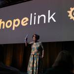 Dr. Tererai Trent speaks at Hopelinks 23rd annual Reaching Out luncheon on the relay of poverty and the baton passed on to the next generation. Katie Metzger/staff photo