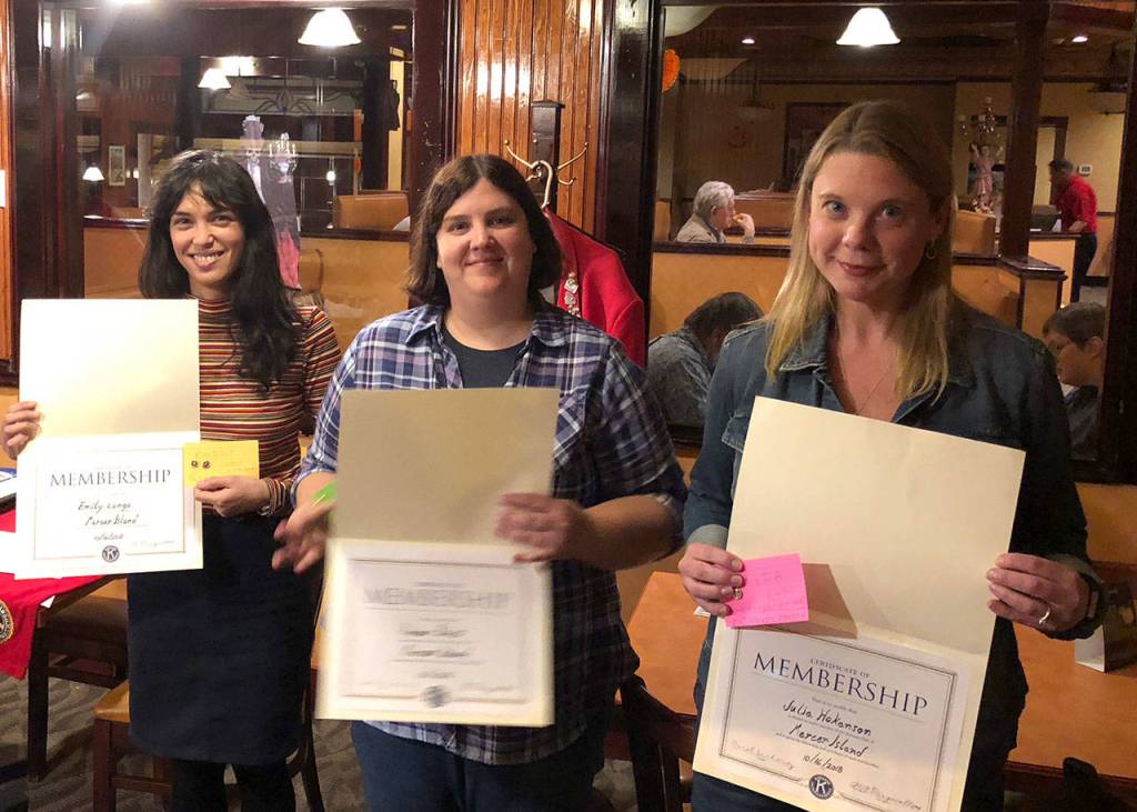 Mercer Island Kiwanis Club welcomed four new members: Mercer Island School District Communications and Alumni Relations Coordinator Craig Degginger (not pictured), Mercer Island High School teacher and Key Club Advisor Emily Lange (left), Lakeridge Elementary School teacher and K-Kids Club Advisor Amber Bobst (center), and Lakeridge K-Kids Club Parent Advisor Julia Hokanson (right). Photo courtesy of Tom Tivnan